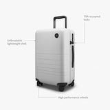 Monos Carry - On Luggage (22"), Lightweight Hardside Spinner Suitcase with TSA Lock, Airline Approved, Stellar White