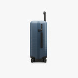 Monos Carry - On Plus Luggage (23"), Lightweight Hardside Spinner Suitcase with TSA Lock, Airline Approved, Ocean Blue