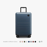 Monos Carry - On Plus Luggage (23"), Lightweight Hardside Spinner Suitcase with TSA Lock, Airline Approved, Ocean Blue