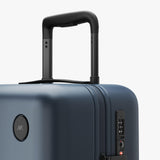 Monos Carry - On Plus Luggage (23"), Lightweight Hardside Spinner Suitcase with TSA Lock, Airline Approved, Ocean Blue