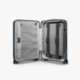 Monos Carry - On Plus Luggage (23"), Lightweight Hardside Spinner Suitcase with TSA Lock, Airline Approved, Ocean Blue
