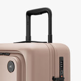 Monos Carry - On Pro Luggage (22"), Hardside Spinner Suitcase with TSA Lock & Front Pocket, Airline Approved, Rose Quartz, Pink