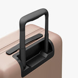 Monos Carry - On Pro Luggage (22"), Hardside Spinner Suitcase with TSA Lock & Front Pocket, Airline Approved, Rose Quartz, Pink