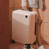 Monos Carry - On Pro Luggage (22"), Hardside Spinner Suitcase with TSA Lock & Front Pocket, Airline Approved, Rose Quartz, Pink