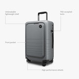 Monos Carry - On Pro Luggage (22"), Hardside Spinner Suitcase with TSA Lock & Front Pocket, Airline Approved, Storm Grey