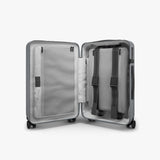 Monos Carry - On Pro Luggage (22"), Hardside Spinner Suitcase with TSA Lock & Front Pocket, Airline Approved, Storm Grey