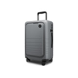 Monos Carry - On Pro Luggage (22"), Hardside Spinner Suitcase with TSA Lock & Front Pocket, Airline Approved, Storm Grey