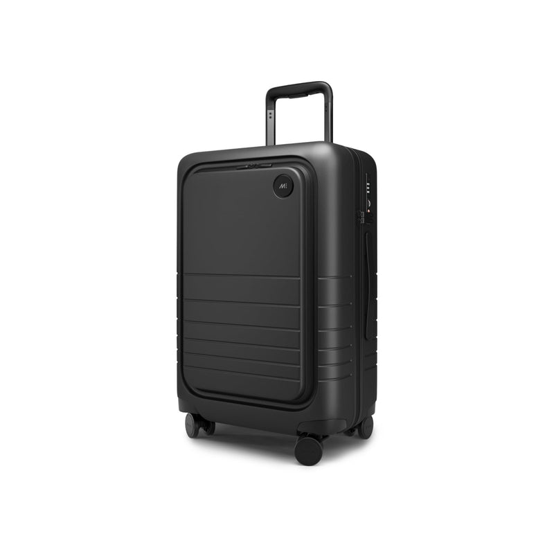 Monos Carry - On Pro Plus Luggage (23"), Hardside Spinner Suitcase with TSA Lock & Front Pocket, Airline Approved, Midnight Black