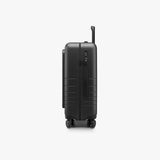 Monos Carry - On Pro Plus Luggage (23"), Hardside Spinner Suitcase with TSA Lock & Front Pocket, Airline Approved, Midnight Black