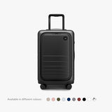 Monos Carry - On Pro Plus Luggage (23"), Hardside Spinner Suitcase with TSA Lock & Front Pocket, Airline Approved, Midnight Black