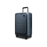 Monos Carry - On Pro Plus Luggage (23"), Hardside Spinner Suitcase with TSA Lock & Front Pocket, Airline Approved, Ocean Blue