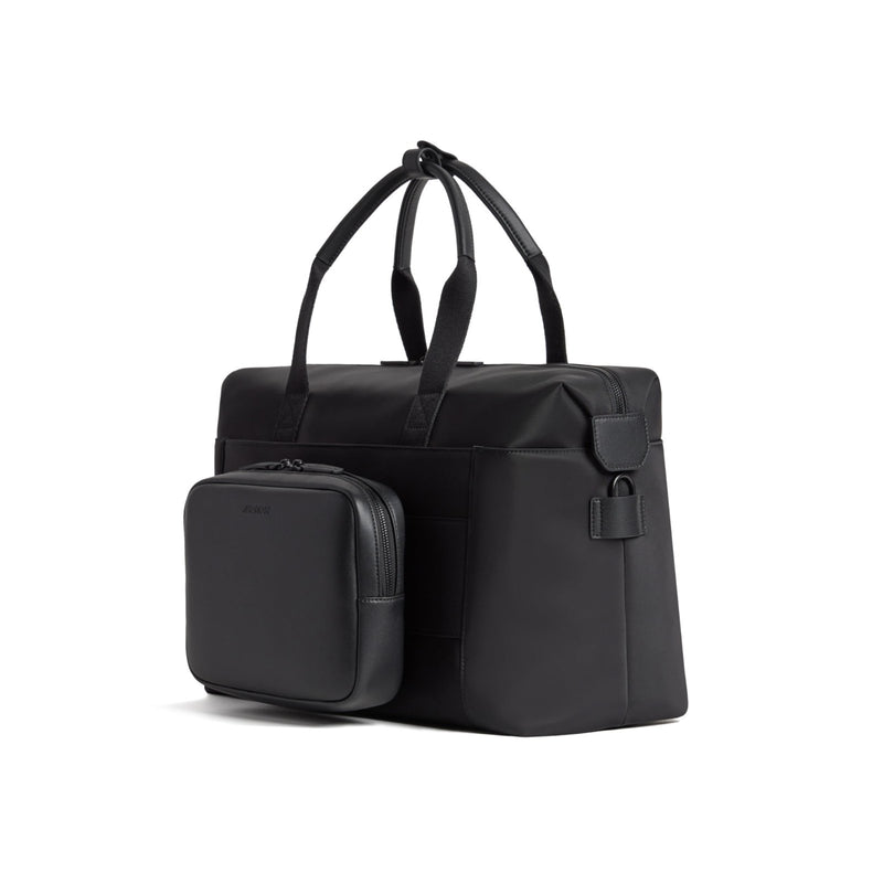 Monos Metro Duffel Nylon, Travel Duffel Bag & Weekender with Shoe Compartment, Lightweight Carry - On Approved, Carbon Black