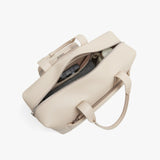 Monos Metro Duffel Vegan Leather Microfiber, Travel Duffel Bag & Weekender with Shoe Compartment, Carry - On Approved, Ivory