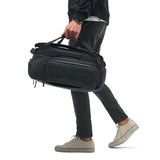 NOMATIC 30L Travel Bag - Convertible Duffel/Backpack, Carry - on Size for Airplane Travel, Everyday Use Laptop Bag, TSA Compliant Black Backpack