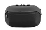 NOMATIC Navigator Sling 1L Bag - 1L w/ 2L Built - In Expansion - Slim & Lightweight Crossbody, Fanny - Pack - Water Resistant Everyday (Black)