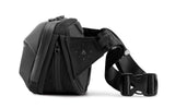 NOMATIC Navigator Sling 1L Bag - 1L w/ 2L Built - In Expansion - Slim & Lightweight Crossbody, Fanny - Pack - Water Resistant Everyday (Black)