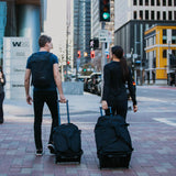 RTIC Road Trip Rolling Duffle Bag with Wheels for Men and Women, Traveling Tote for Camp, Travel, Gym, Weekender, Camping, Overnight Carry On, Sports, Spacious, Water Resistant, Medium, Navy & Denim