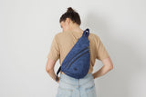 Sakroots On The Go Large Sling Backpack in Eco - Twill, Convertible Crossbody Bag, Black Spirit Desert