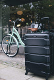 Samsonite Omni PC Hardside Expandable Luggage with Spinner Wheels, Black, Checked - Medium 24 - Inch