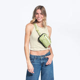 Sherpani Hyk, Small Sling Bag, 1L Belt Bag, Lightweight Travel Fanny Pack, Sling Crossbody Purse with RFID Blocking (Palm)
