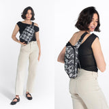 Sherpani Metro, Reversible Anti - Theft Sling Bag, 5L Travel Crossbody Backpack, Chest Purse for Travel, Hiking, or Everyday Pickpocket Protection (Houndstooth)