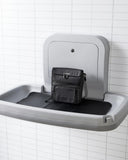 Skip Hop Travel Baby Changing Pad with Easy - Clean Surface, Covers Public Changing Stations, Wipes Pocket, Diaper Storage, Disposable Bag Dispenser and Magnetic Wipes Pocket, Clean Slate, Black