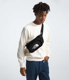 The North Face Explore Hip Fanny Pack | Crossbody Sling with Water Repellent Finish, 3 Liters, Adjustable Strap, TNF Black/TNF White - NPF, One Size