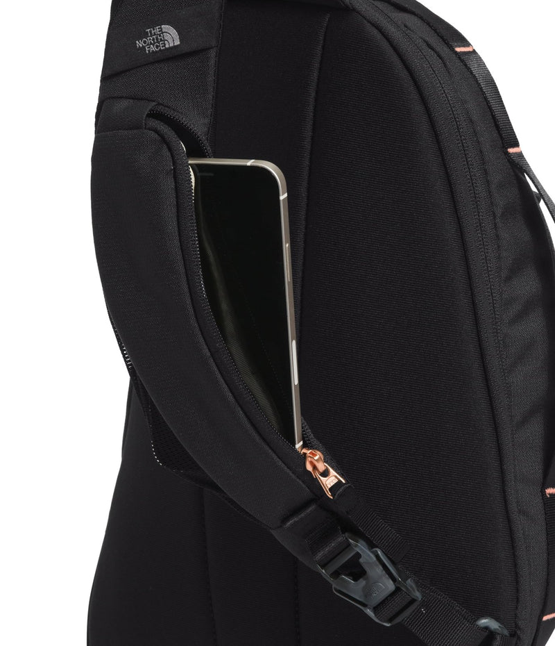 The North Face Women's Isabella Sling - Slim Carry Crossbody Bag with Large Main Compartment, Water - Repellent Finish, TNF Black Light Heather/Burnt Coral Metallic - NPF, One Size