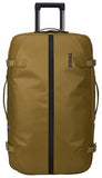 Thule Aion 70cm Wheeled Duffel - Wet/Dirty storage pocket - Smooth rolling wheels - Interior compression straps - Lockable exterior zippers - 100% recycled fabrics - Waxed, PFC - free fabric