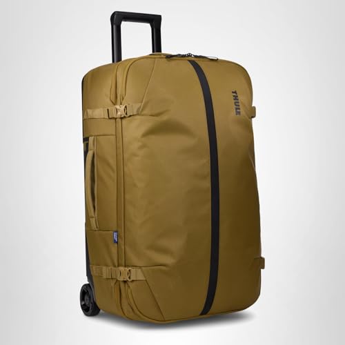 Thule Aion 70cm Wheeled Duffel - Wet/Dirty storage pocket - Smooth rolling wheels - Interior compression straps - Lockable exterior zippers - 100% recycled fabrics - Waxed, PFC - free fabric