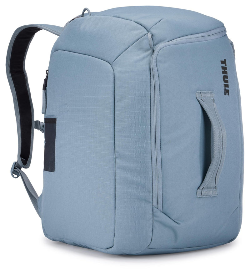 Thule RoundTrip 45L Boot Backpack - Storage compartments to organize and protect gear - Boot bag for ski and snowboard travel - Soft pocket for goggles and helmet - Built in standing pad