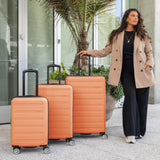 Travel Select Snowcreek Hardside Expandable Spinner w/USB Port, Tangerine, 21 - Inch Carry - on