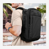 TravisMathew Lateral Convertible Travel Backpack/Briefcase with Laptop Compartment & Trolley Sleeve, Black