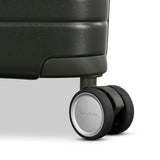 Virtuosa Hardside 21 Inch Carry On Luggage - Airline Approved with 360° Spinner Wheels, RightHeight™ Adjustable Handle - Zippered WetPak™ - TSA Lock - Expandable Light Polycarbonate Shell - Pine Green