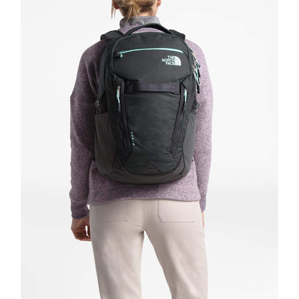 The North Face Women's Surge Backpack, Asphalt Grey Light Heather/Wind– backpacks4less.com The North Face Women's Surge Backpack, Asphalt Grey Light Heather/Wind– backpacks4less.com